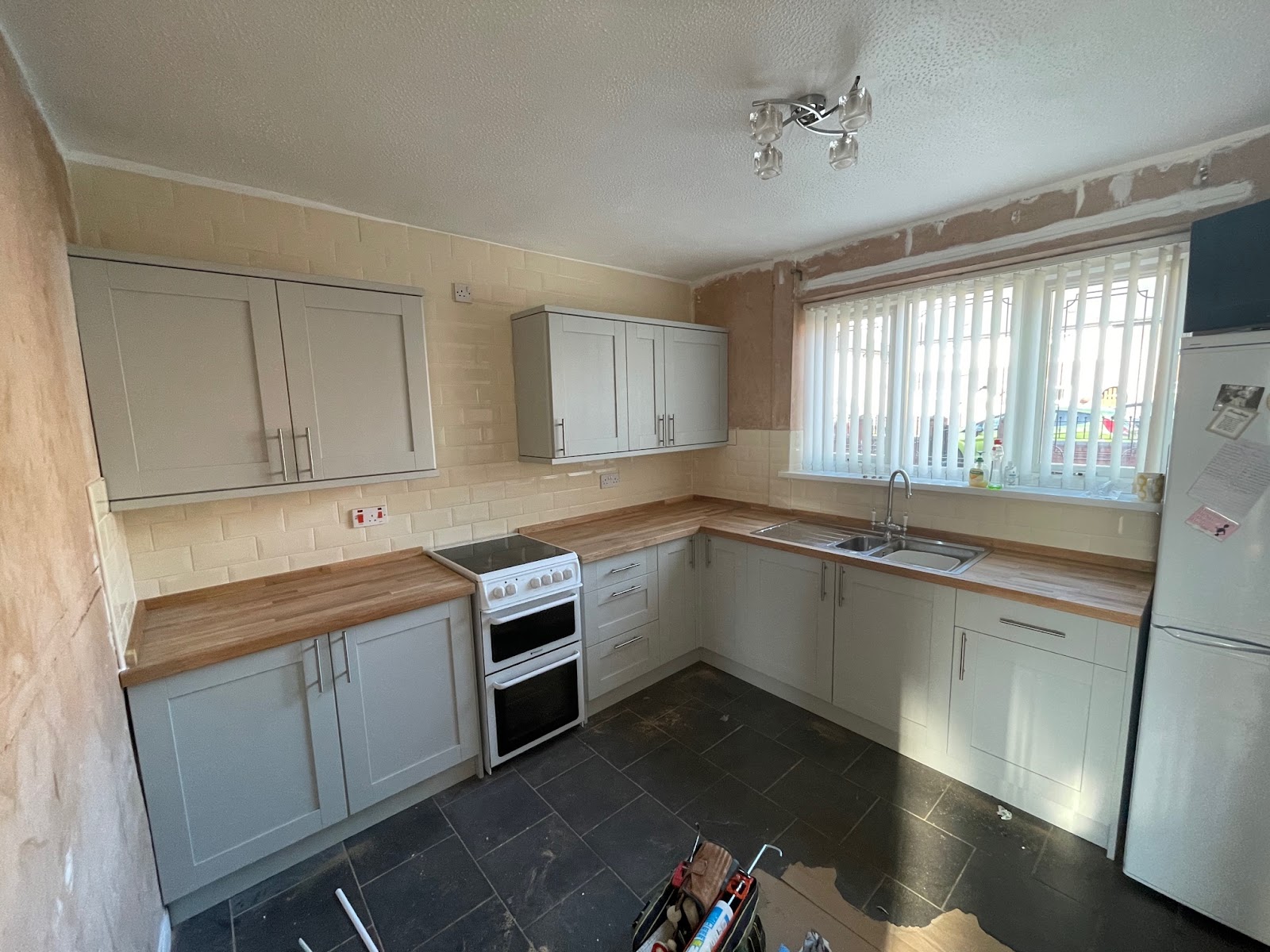 Howdens kitchen matched to existing tiling